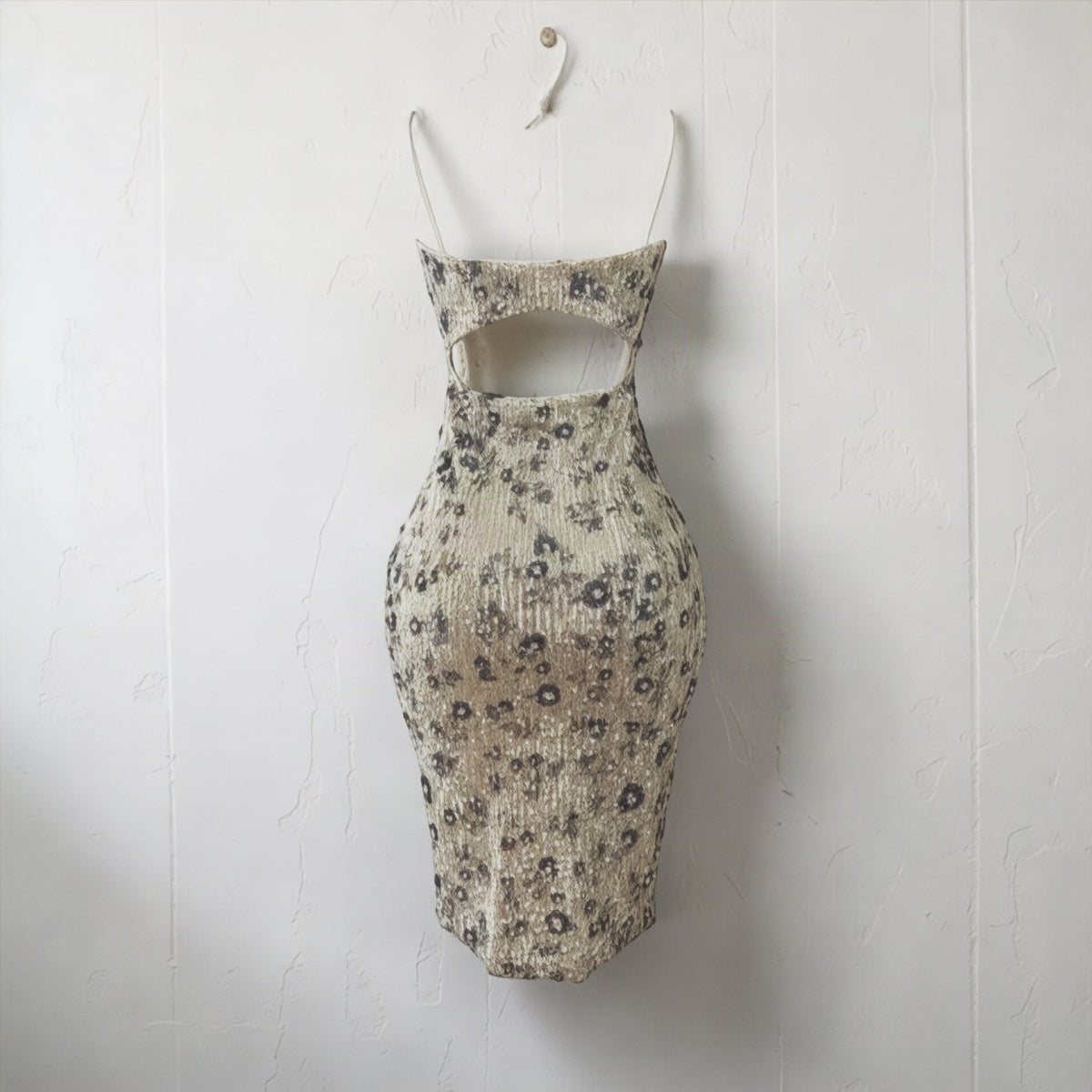 Flow Felines champagne mini dress with floral sequin embellishments, spaghetti straps, and an open-back design.